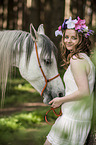 woman and arabian horse