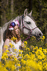woman and arabian horse