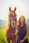 woman and arabian horse
