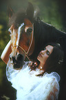 woman and arabian horse
