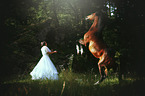 woman and arabian horse