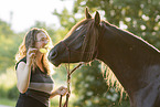 woman and arabian horse