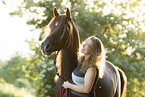 woman and arabian horse
