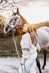 woman and arabian horse