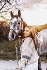 woman and arabian horse