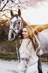woman and arabian horse