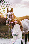 woman and arabian horse