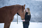 woman and Austrian warmblood