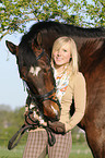 woman and Bavarian warmblood