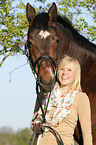 woman and Bavarian warmblood