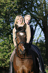 women and Bavarian warmblood