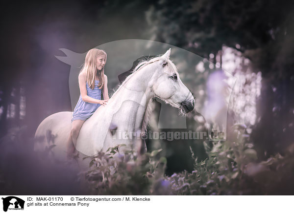 girl sits at Connemara Pony / MAK-01170
