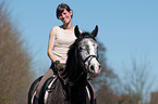 woman rides KWPN
