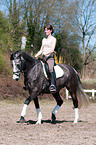 woman rides KWPN