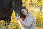 woman with english thoroughbred