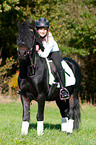 girl rides Fellpony
