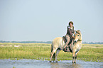 woman rides Fjord
