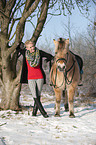 woman with Fjord horse