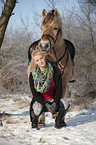 woman with Fjord horse