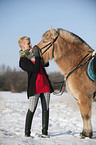 woman with Fjord horse