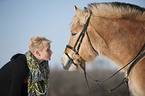 woman with Fjord horse