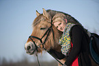 woman with Fjord horse