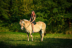 woman rides Fjordhorse