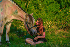 woman and Fjordhorse