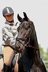 woman and frisian horse