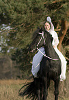 angel and friesian horse