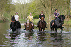 4 riders with horses