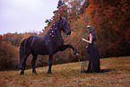 young woman with Frisian Horse