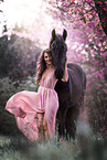 woman and Friesian Horse