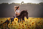 woman and Friesian Horse