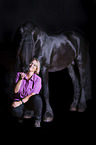 Friesian Horse with a woman