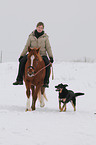 woman rides pony