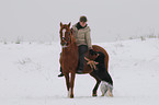 woman rides pony