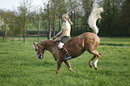 girl rides pony