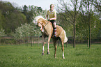 girl rides pony