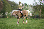 girl rides pony