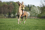 girl rides pony