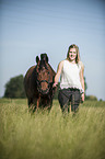 woman and German Riding Pony