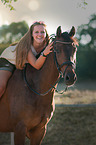 woman and German Riding Pony