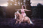 woman and German Riding Pony