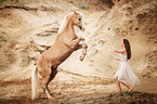 woman and German Riding Pony