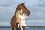woman with German Riding Pony