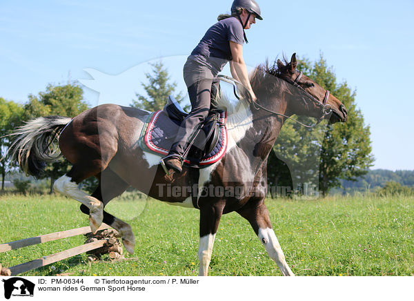 woman rides German Sport Horse / PM-06344