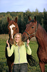 young woman with horses