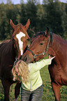 young woman with horses