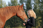 young woman with horse